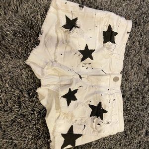 Klique b star splatter painted white jean shorts